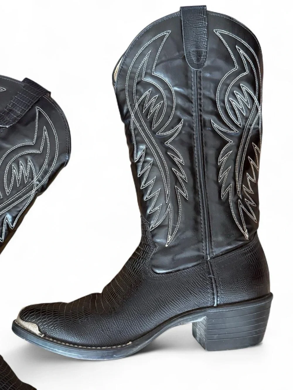 Bronco black leather boots with silver toe embellishments